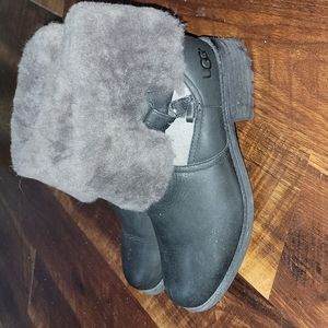 Black UGG booties with fur trim. Women's size 10.